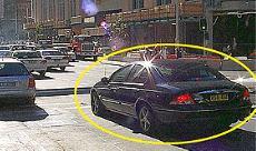 category intersections - The traffic on the other side of this intersection has stopped. You are in the car shown and want to cross the intersection. The lights are green. What should you do?