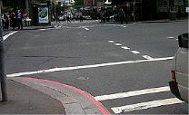 category intersections - You wish to turn left here. The pedestrian lights are flashing red. You should: