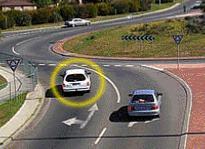 category intersections - In this roundabout with two lanes, can the marked car turn right?
