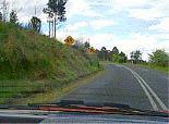 category traffic-lights-lanes - When the road is marked this way are you permitted to cross the lines and overtake?